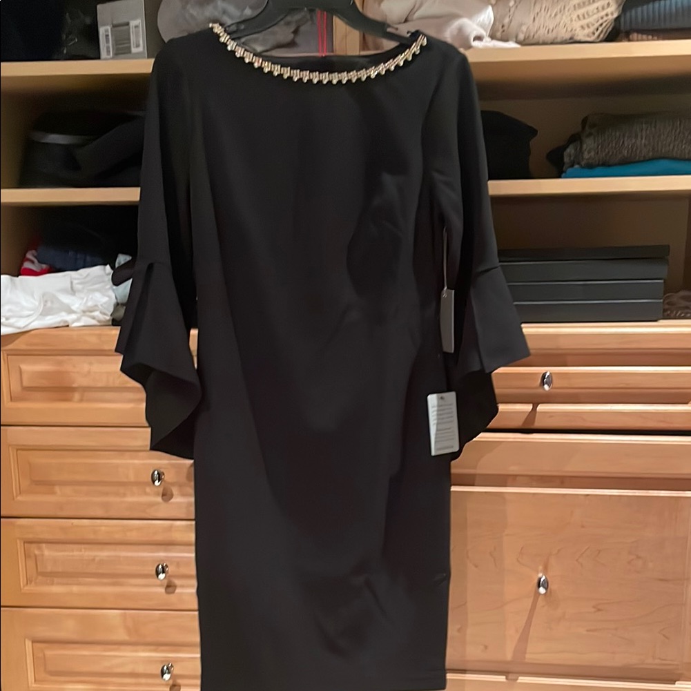 Black Sheath Dress With Embellished Neckline And Bell Sleeves